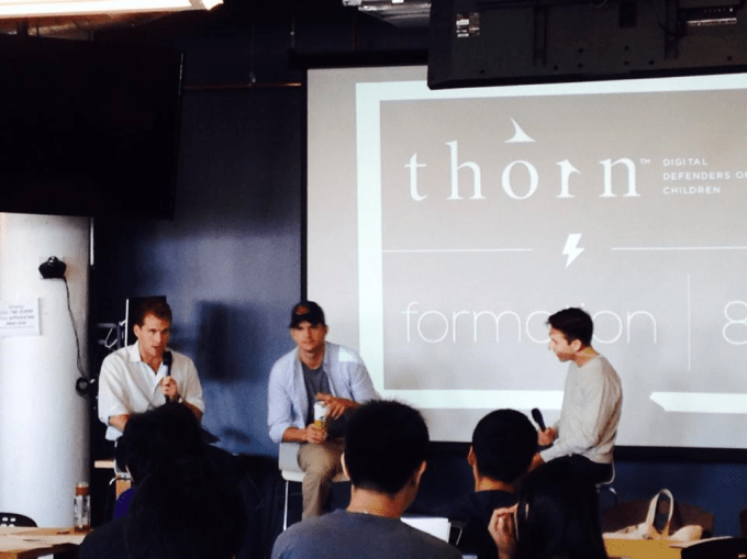 Joe Lonsdale (Formation 8) and Ashton Kutcher (Thorn) are interviewed by Pierre Arys (Formation 8) in front of the 25 teams at the anti-child-sex-trafficking hackathon at Twilio in San Francisco on August 23.