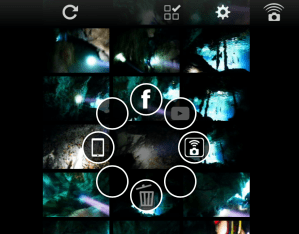 Something about a phone, a camera, a trash can, and Facebook? Even just capturing this screenshot was nigh-on impossible.
