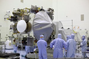 OSIRIS-REx spacecraft hoisted on a rotation stand at NASA Kennedy Space Center / Image courtesy of NASA