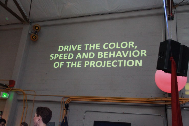 Saito Group demonstrated a poetry-generating projector at BuzzFeed Open Lab's Show and Tell.